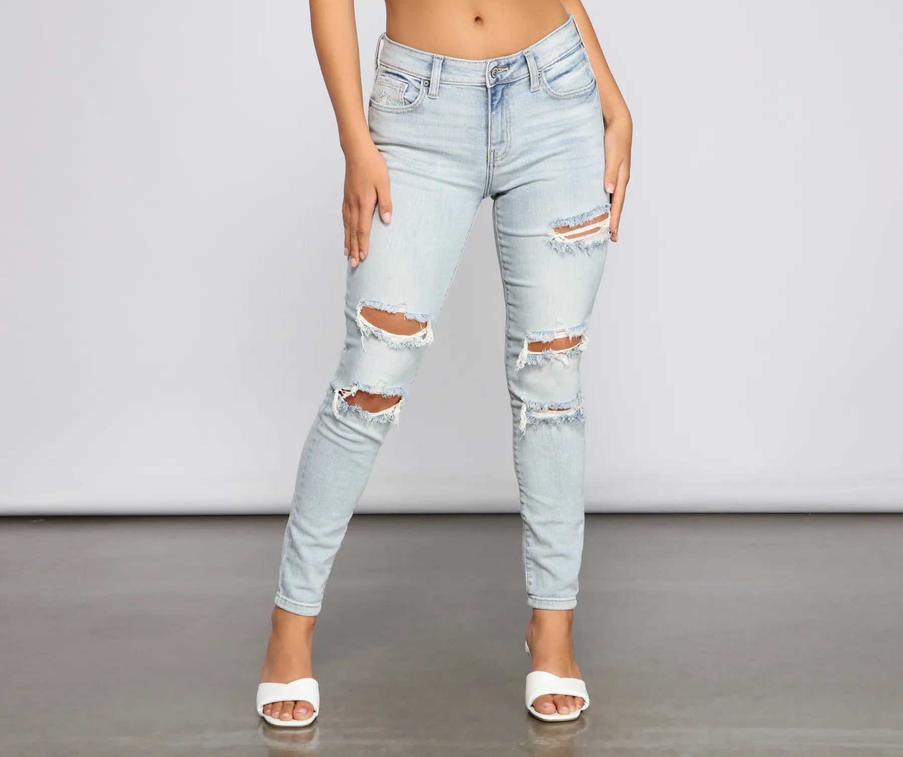 women's stone-washed denim jeansJude Mid-Rise Destructed Skinny Jeans