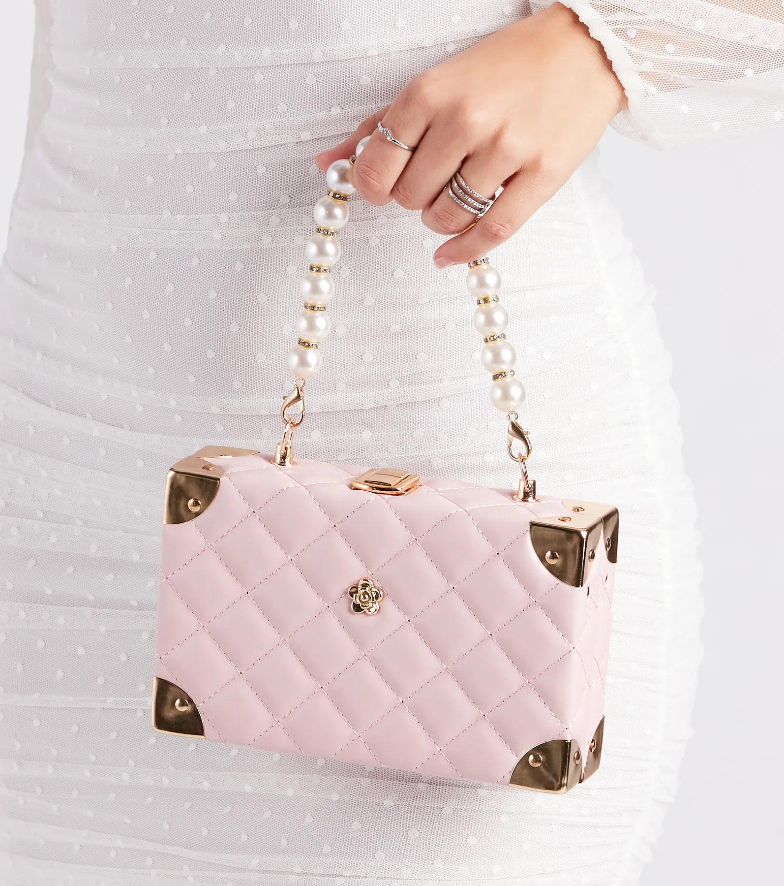 women's tops for those who want to add a personal touch to their wardrobe with unique and one-of-a-kind piecesChic Details Pearl Top Handle Quilted Handbag